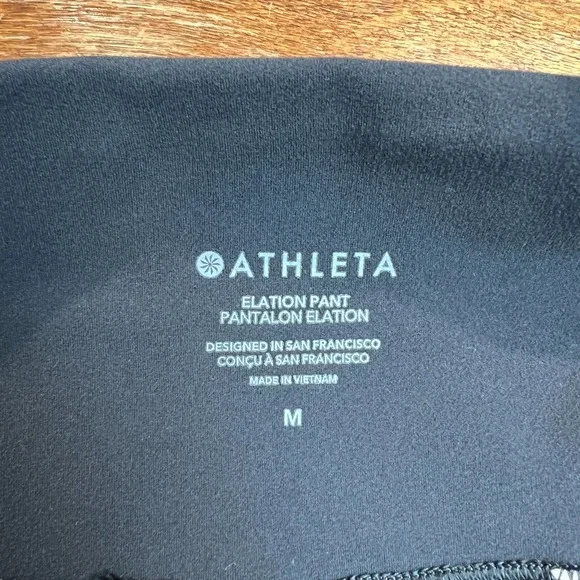 Athleta Elation Pants Women Medium Black Tapered Pleated Stretch Knit Athleisure - Picture 9 of 14